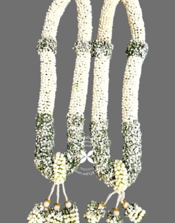 Order fresh handcrafted wedding garlands online from India's top designers. offering pan India shipping for unique high quality fresh flower Wedding Garland