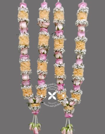 Order fresh handcrafted wedding garlands online from India’s top designers. offering pan India shipping for unique high quality fresh flower Wedding Garland